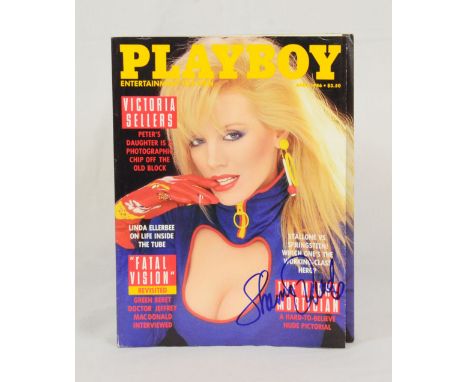 April 1986 Playboy signed by model, actress Shannon Tweed  in blue marker and pornographic actress, model and Playboy Playmat