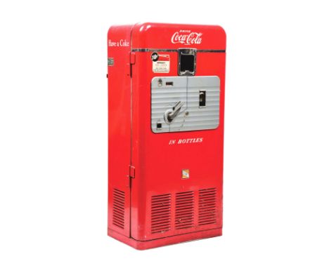 A real nice VMC Model 33 Coca-Cola vending machine in pre-restoration condition. Some small dents to the exterior and scratch