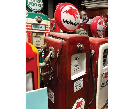 Original Wayne model 70 1950's gas pump with the original patina and working lights. Reproduction signs and  Mobilgas globe. 