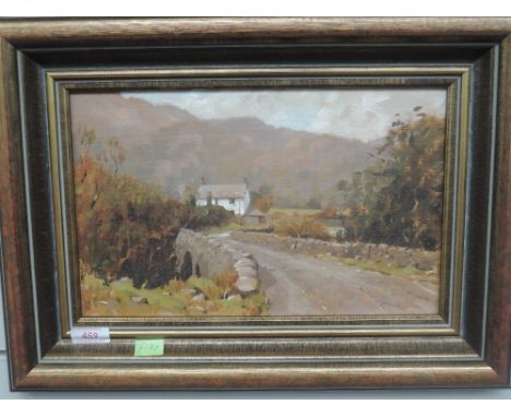 An oil painting on board, R Martin Tomlinson, Ulpha Bridge Duddon valley, signed and attributed verso, 20 x 33cm, plus frame 