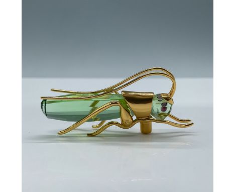 Beautiful green crystal and sterling silver, gold-plated figurine. Marked 925. Accompanied by a facetted diamond crystal. Swa