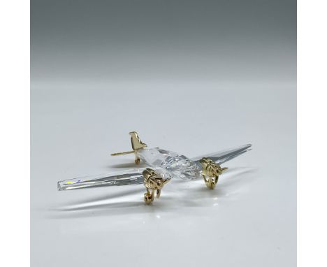 Crystal moments figure is part of the Journeys theme. Made of clear crystal and appointed with 18k gold-plated metal trim. Sw