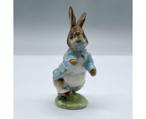 Glossy figure of Peter Rabbit running over a patch of grass. Beswick Beatrix Potter backstamp. Issued: 1948Dimensions: 2.75"L