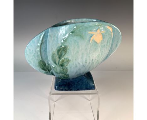 This stunning Roseville Pottery vase features the iconic Wincraft design, introduced in 1948. Showcasing a soft blue glaze wi