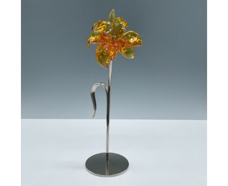 Beautiful topaz crystal faceted flower. Part of the Exotic Flowers collection. Set on a rhodium base, stem and pistils. Swaro
