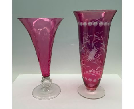 Gorgeous duo of glassware that consists of a swirl patterned vase with a hobnail design at its base, and a vase with etched f