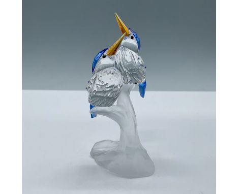 This Swarovski Crystal Malachite Kingfisher figurine includes two clear crystal birds with topaz beaks and sapphire accents. 