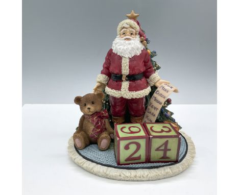 Tune: Here Comes Santa Claus. A beautiful Santa Claus against a Christmas tree, including two numeric blocks to be placed in 