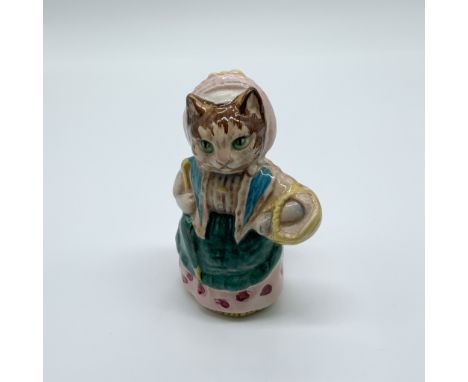 This vintage Beswick Beatrix Potter figurine, modeled by Albert Hallam, depicts the character Cousin Ribby in exquisite detai