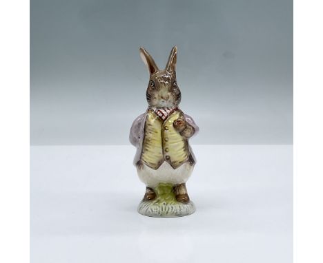 Glossy porcelain. Features a standing rabbit with one arm behind his back wearing a yellow vest and purple jacket. Royal Albe