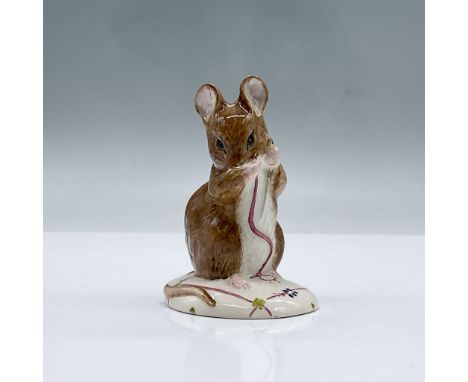 Glossy porcelain. Features a mouse holding a needle and a single strand of thread. Royal Albert Beatrix Potter backstamp. Thi