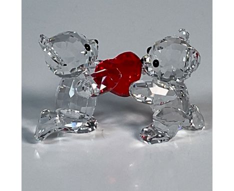 This adorable pair of Kris Bears sparkle in clear crystal. They are joined by a light Siam crystal heart. Swarovski backstamp