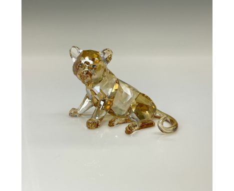 Shimmers in fully faceted golden shine crystal with satin crystal stripes; padparadscha crystal nose and moroda crystal eyes.