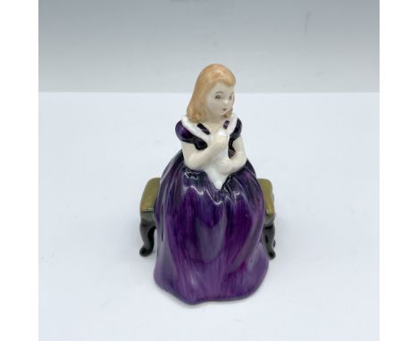 Lovely figure of a young girl sitting delicately on a cushioned bench in her purple dress. Royal Doulton backstamp. Artist: P
