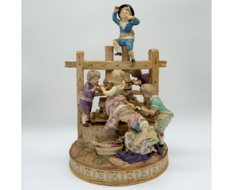 This lot features a charming Meissen porcelain figurine group depicting children in a rural setting, crafted by the renowned 