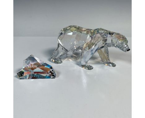 This 2011 annual edition polar bear is named Siku. He is crafted from moonlight colored crystal, with jet eyes and nose. Siku