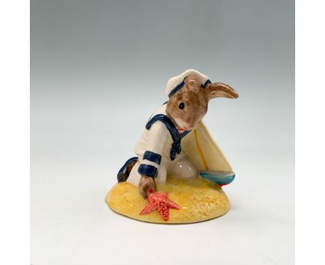 This charming figurine, titled "Sailor Bunnykins," was introduced in 1997 as the Bunnykins of the Year. Designed by Graham To
