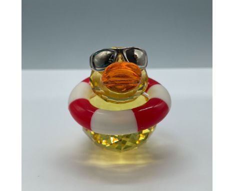 Playful facetted yellow crystal duck with an orange beak, completed by a red and white floater and metal glasses. This item h