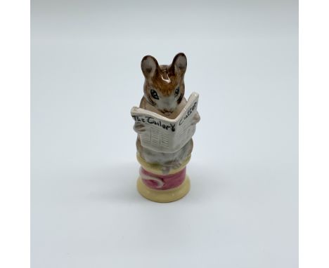 A charming porcelain figurine titled "Tailor of Gloucester," based on Beatrix Potter's beloved children's story. This piece s