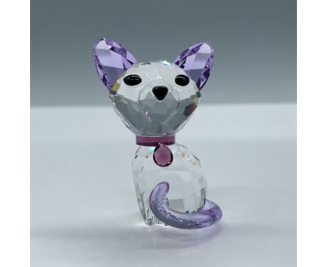 Adorable facetted crystal cat with purple crystal ears, tail and collar. Swarovski etched backstamp. This item has its origin