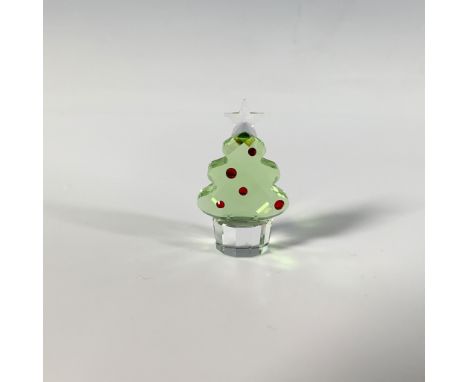 A charming holiday decor featuring a small faceted crystal Christmas tree adorned with red gemstones. Swarovski marking. This