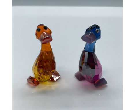 Gorgeous duo of Medium Topaz and Fuchsia Satin crystal ducks. Swarovski etched backstamp. This item has its original box. Box