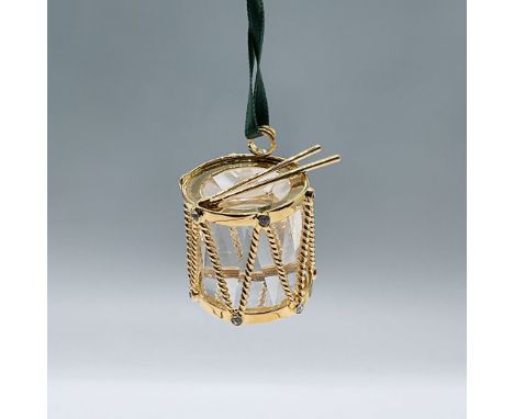 This adorable drum ornament was part of the Ornaments theme group. It is made out of clear crystal with golden details. This 