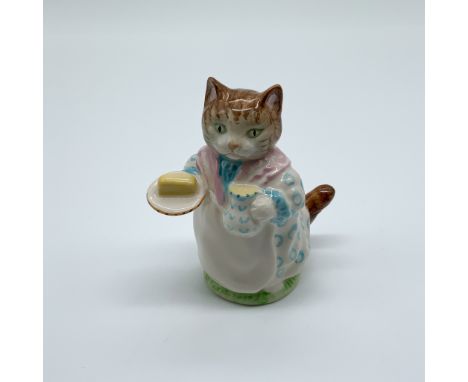 This charming porcelain figurine depicts Ribby, the beloved character from Beatrix Potter's classic tales. Marked with "Beatr
