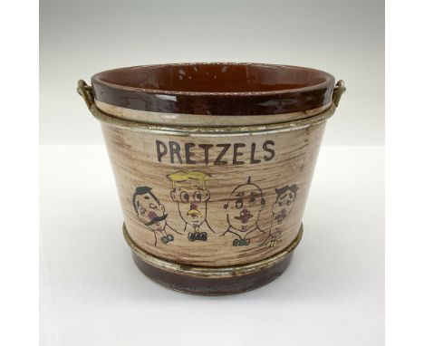 A rare and highly collectible vintage snack pail. This charming piece of Americana is perfect for any mid-century modern coll