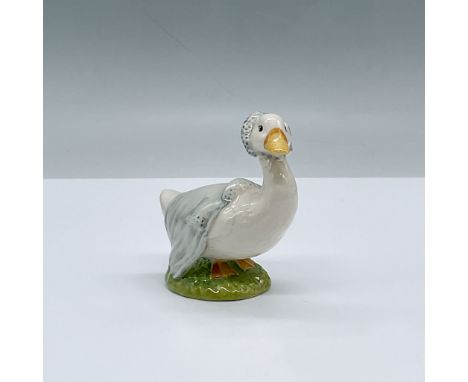 Glossy porcelain. Features a white duck on a patch of grass. Beswick Beatrix Potter backstamp. This item has its original box