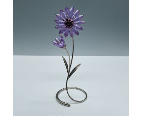 Beautiful violet crystal with amethyst crystal accents. Set on a silver tone metal stand. Swarovski etched backstamp. This it