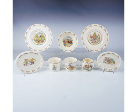 A delightful collection of Royal Doulton Bunnykins tableware featuring whimsical hand-drawn scenes of anthropomorphic rabbits
