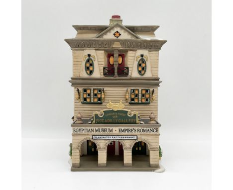 The Department 56 Piccadilly Gallery is a stunning addition to the Dickens Village Series celebrating the charm and architect