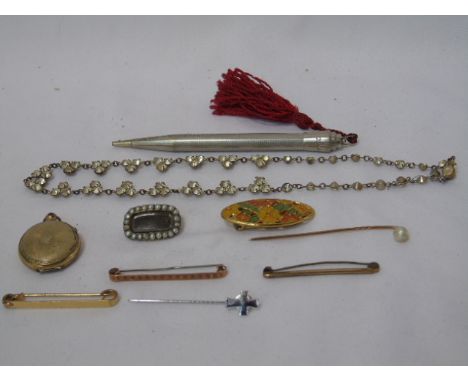 Collection of interesting items to include pencil, brooches and a gold stick pin