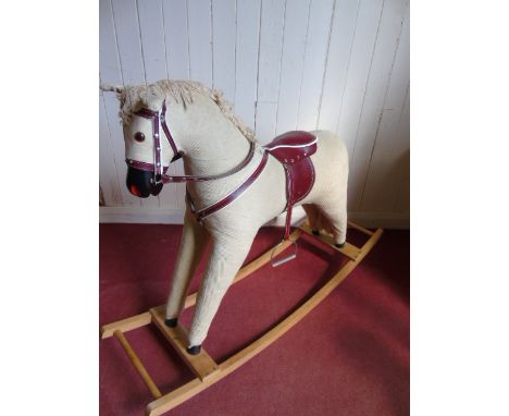Vintage fabric rocking horse with straw filled body