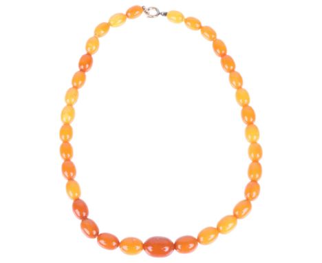 A Vintage single-strand graduated butterscotch amber bead necklace, beads measure 16.6-10.3mm, 40cm, 17.3gAll beads present, 