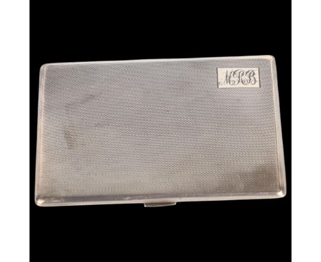 An Art Deco George VI rectangular silver cigarette case, maker FLR, Birmingham 1946, allover and internal engine turned decor