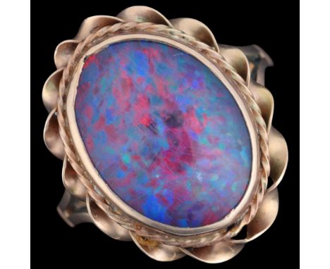 A Vintage 9ct gold opal triplet dress ring, setting height 20.9mm, size R, 4.6gNo damage or repair, only light surface wear, 
