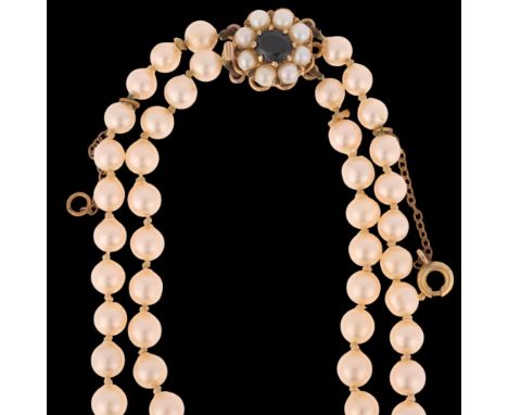 A Vintage double-strand graduated pearl bead necklace, with 9ct gold teal sapphire and pearl cluster clasp, pearls measure 9.