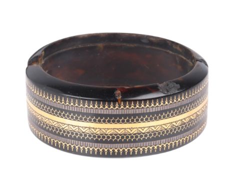 An Antique Victorian gold and silver inlaid tortoiseshell cuff bangle, band width 27.5mm, internal circumference 17cm, 32.8gB
