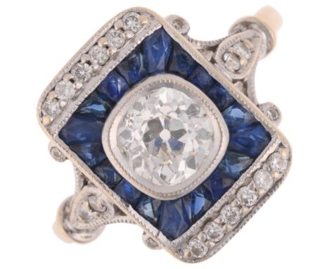 An Art Deco style 18ct white gold sapphire and diamond plaque ring, centrally set with a 0.5ct old-cut diamond within a borde