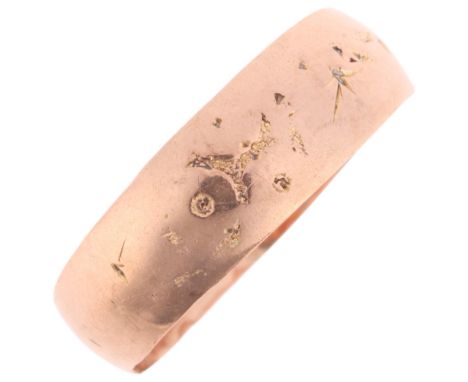 An Antique 9ct rose gold wedding band ring, maker WL, Birmingham 1910, floral engraved decoration, band width 5.7mm, size L, 