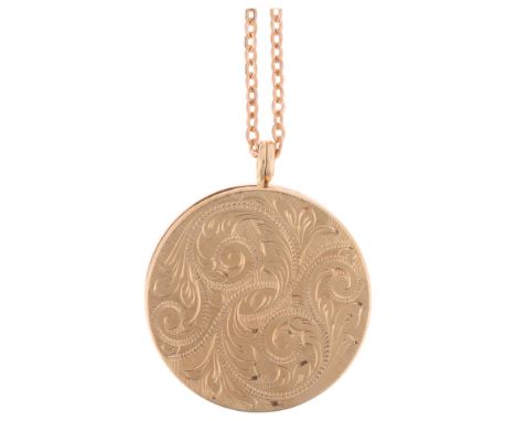 A Vintage 9ct gold double photo locket pendant necklace, maker B&S, Birmingham 1969, circular form with foliate engraved deco