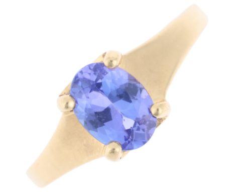 An 18ct gold single stone tanzanite dress ring, maker DK, Birmingham 2007, claw set with oval mixed-cut tanzanite, setting he