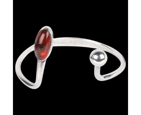NIELS ERIK FROM - a Danish modernist sterling silver amber torque bangle, setting height 41.7mm, internal circumference appro