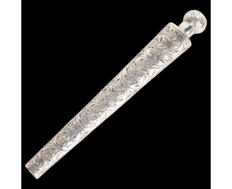 A large Victorian silver scent flask, Stuart Clifford, London 1884, elongated conical form with allover relief embossed folia