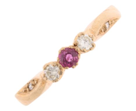 A 9ct gold three stone ruby and diamond ring, maker SJ, London 1990, setting height 3.3mm, size O, 2.1gNo damage or repair, a