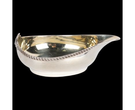 A George III silver pap boat, William Bateman, London 1815, with gadrooned border and gilt interior, 13cm, 2.6ozNo damage or 