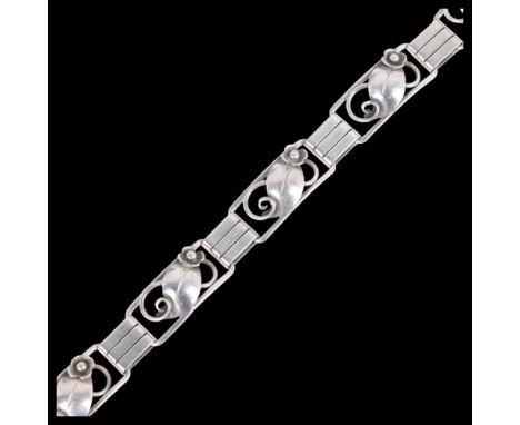 HANS JULIUS R LARSEN - an Art Deco Danish silver floral panel bracelet, band width 13.5mm, 19cm, 23.2gNo damage or repair, on