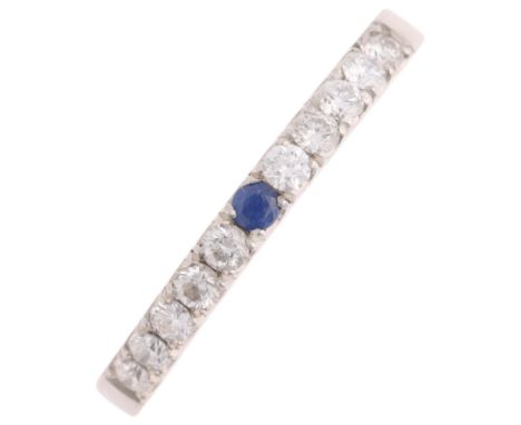 A platinum sapphire and diamond half eternity band ring, maker CR, London 2022, set with single round-cut sapphire flanked by